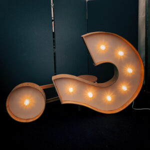Image of a large question mark sign tipped over